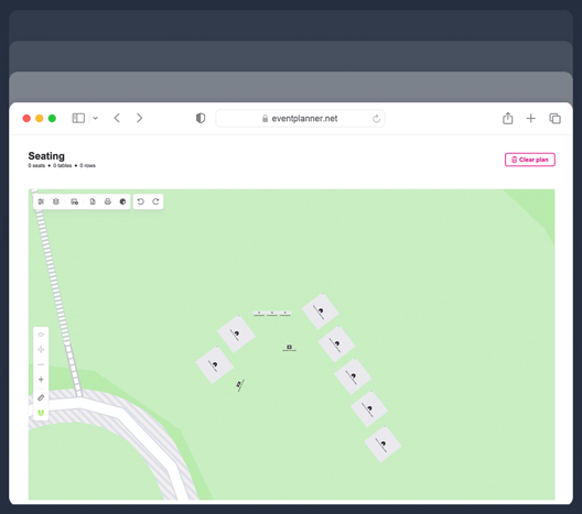Een festivalterrein op schaal getekend op een kaart in de plattegrondontwerper van eventplanner.net, met tenten, dranghekken en een luidspreker.